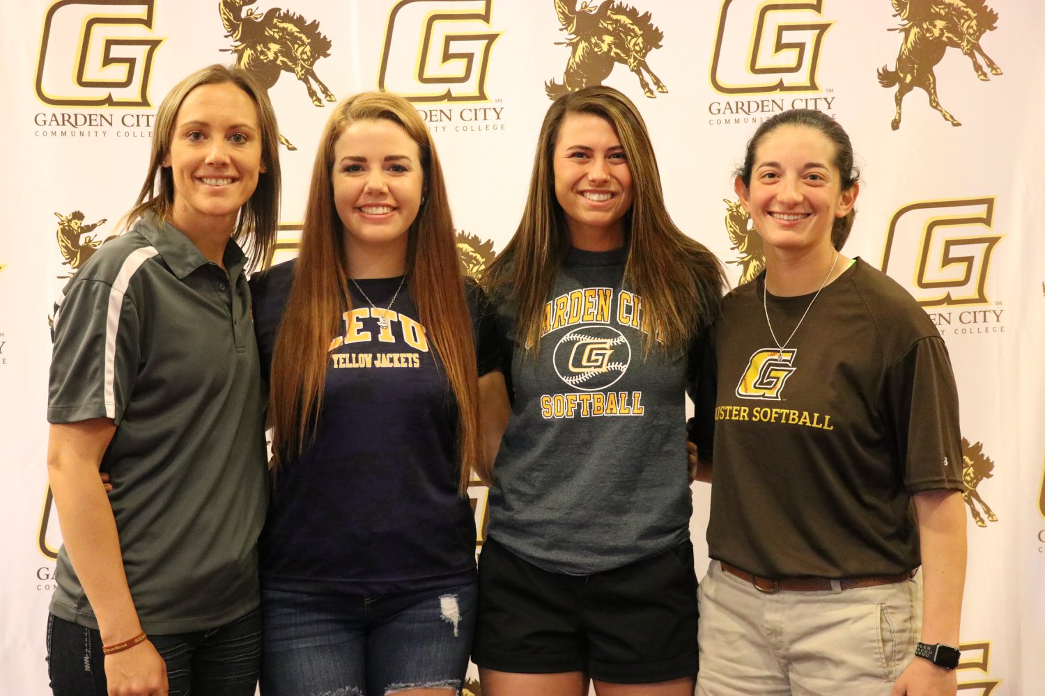 Two Broncbuster softball players sign with four-year schools